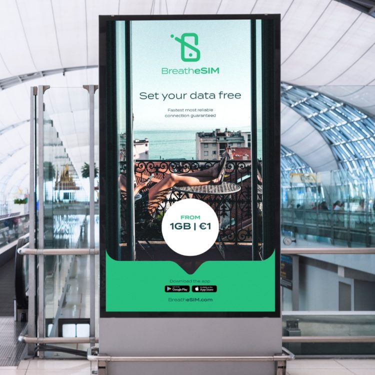 Airport advertising for BreatheSIM saying 'set your data free'